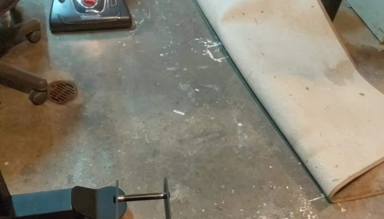 Vacuuming the Concrete Basement Floor